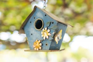 close up photo of a wooden bird house