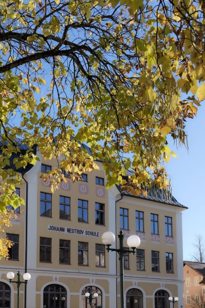 charming school building in autumn bad ischl